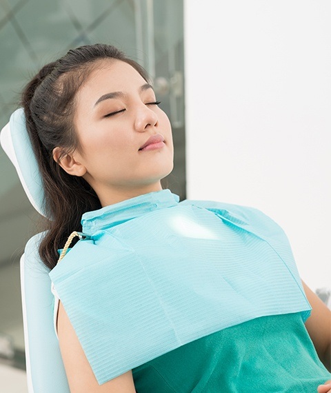 Patient relaxing while receiving I V sedation dentistry in Dallas