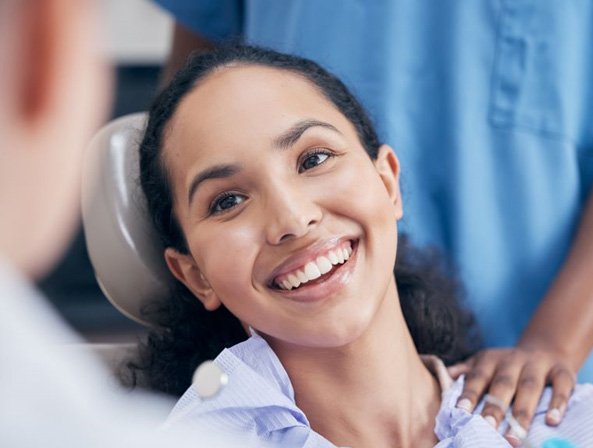 Close-up of happy patient in dental treatment chair