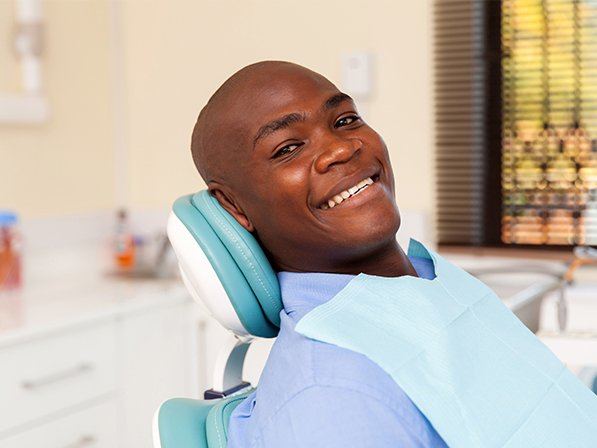 Man smiling after I V sedation dentistry visit
